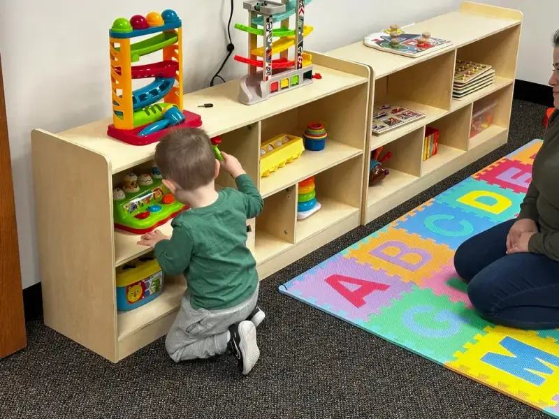 Center-based ABA therapy session for young children at First Steps Developmental Services in Woburn