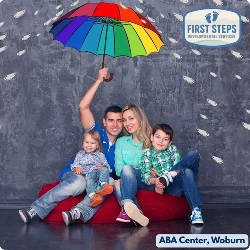 Family sharing a joyful moment together, illustrating how coaching at First Steps Developmental Services is shaped around each family's own routines, priorities, and goals.