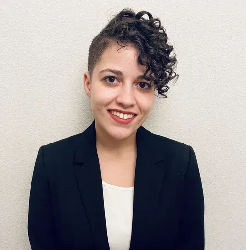 Daniela Silva, MS, BCBA, LABA, Clinical Supervisor and Lead BCBA at First Steps Developmental Services, smiling in professional attire, emphasizing expertise in Applied Behavior Analysis and support for children and families.
