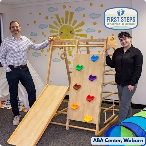 Young child engaged in play-based ABA therapy at First Steps Developmental Services
